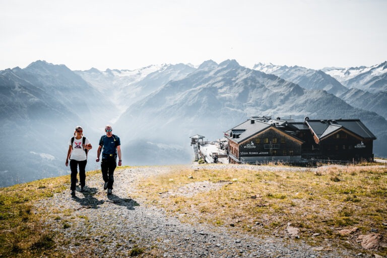 Etappe 04 / 05 in der Wildkogel-Arena am Hohe Tauern Panorama Trail von Daniel Kogler.
01_2022,  2020,  Austria,  Beherbergung,  Berg,  Daniel Kogler,  Ferienregion Nationalpark Hohe Tauern,  Freizeitaktivität,  Gastronomie,  Herbst,  Hohe Tauern Panorama Trail,  Landschaft,  M+ Presse Berg,  M+ Presse Sommer,  Mensch,  Mittersill+,  Oberpinzgau,  Oktober,  Pinzgau,  Salzburg,  Salzburger Land,  Tag,  Wandern,  Weitwandern,  Wildkogel Arena,  Wildkogelhaus,  Österreich,  Building,  Dirt Road,  Gravel,  Housing,  Human,  Nature,  Outdoors,  Person,  Road
